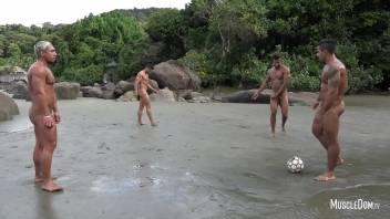 Naked football on the beach